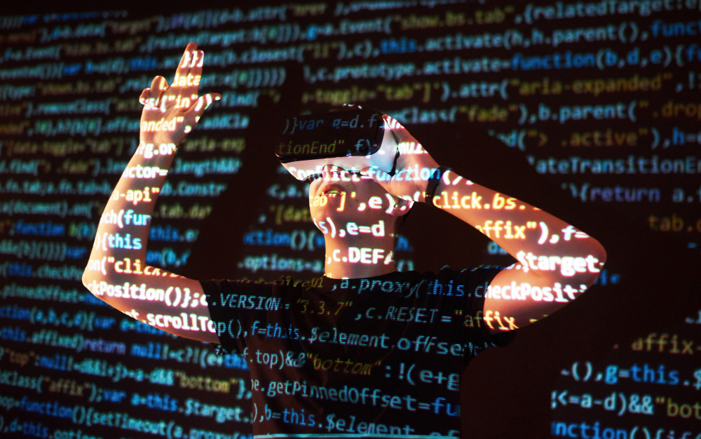 Developer working on Python code across multiple screens