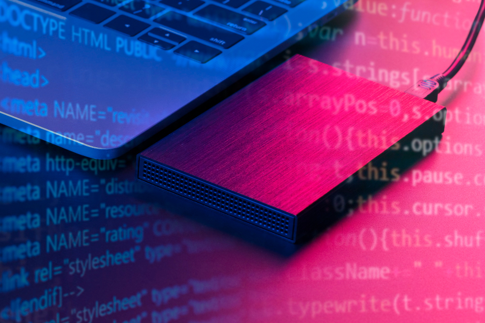Node.js source code displayed on a keyboard-lit screen
