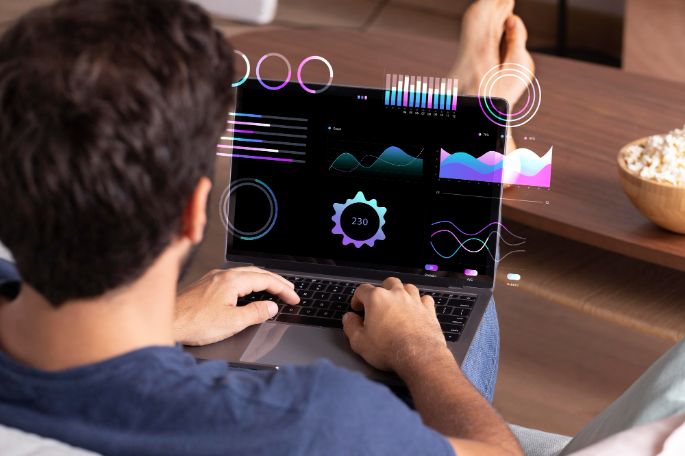 Hands collaborating over digital charts and analytics on a tablet