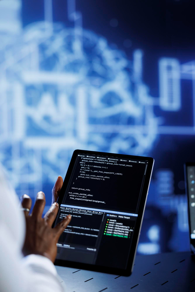Strategic IT approach – developer working on tablet with code visualization