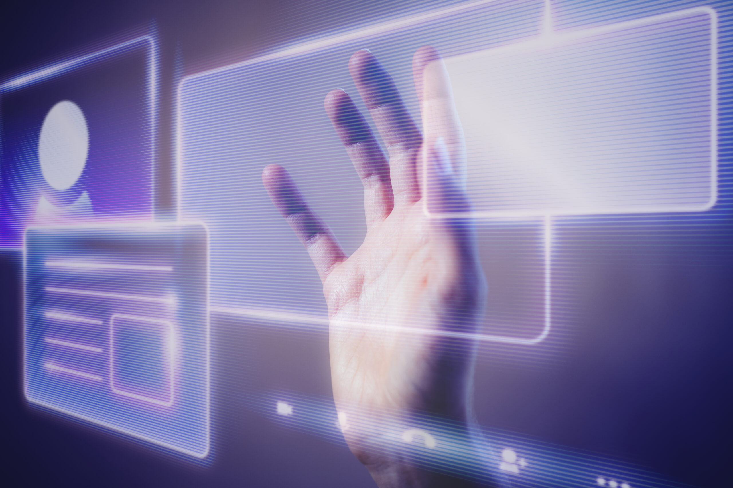 Woman interacting with a holographic technology interface